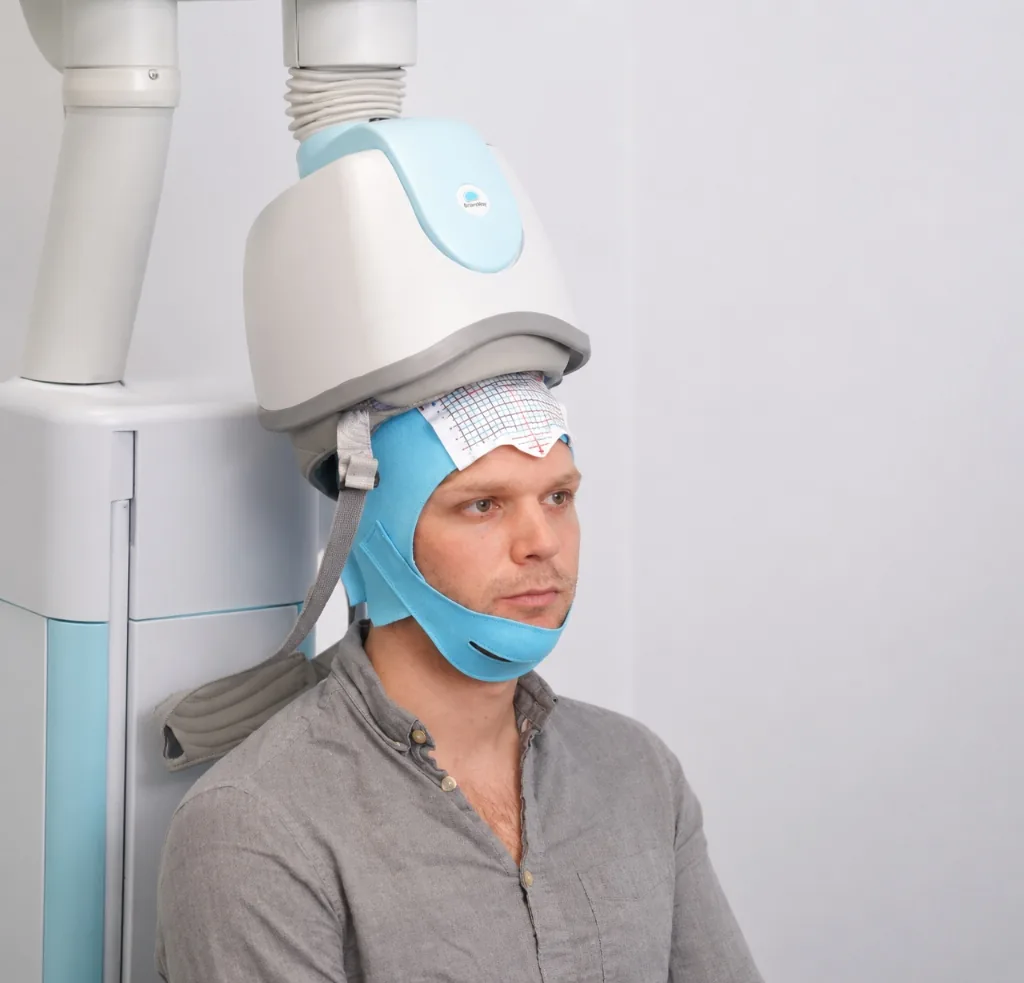 Patient receiving Deep TMS Therapy treatment